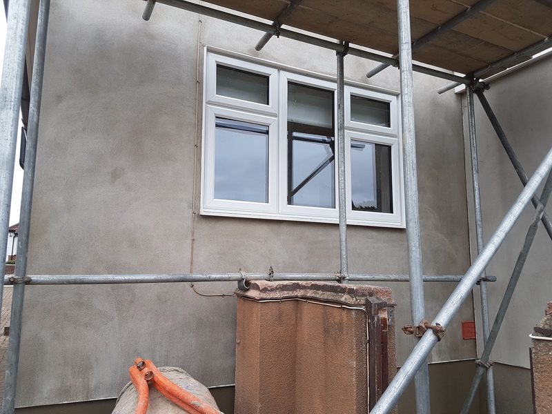 Rear wall rendered from scaffold – sponge finish by CT2 Plastering & Rendering, Orpington