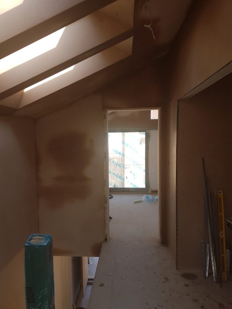 Loft landing – sloped ceilings and walls plastered by CT2 Plastering & Rendering, Orpington