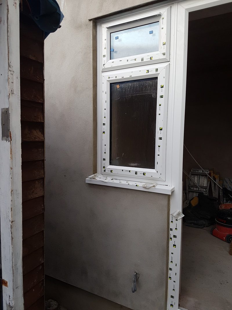 Garden room rendered inside around new window and door by CT2 Plastering & Rendering, Orpington
