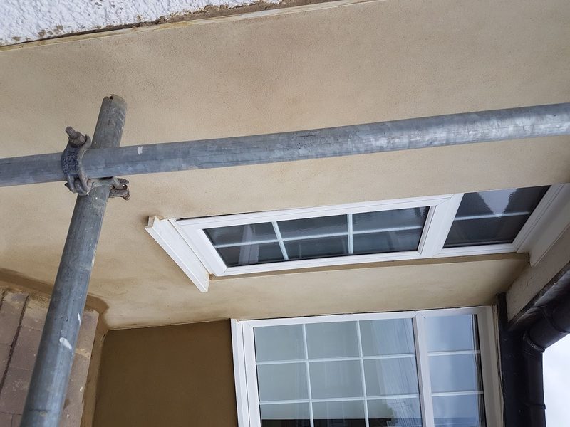 Rendered bay and soffit above front windows by CT2 Plastering & Rendering, Orpington